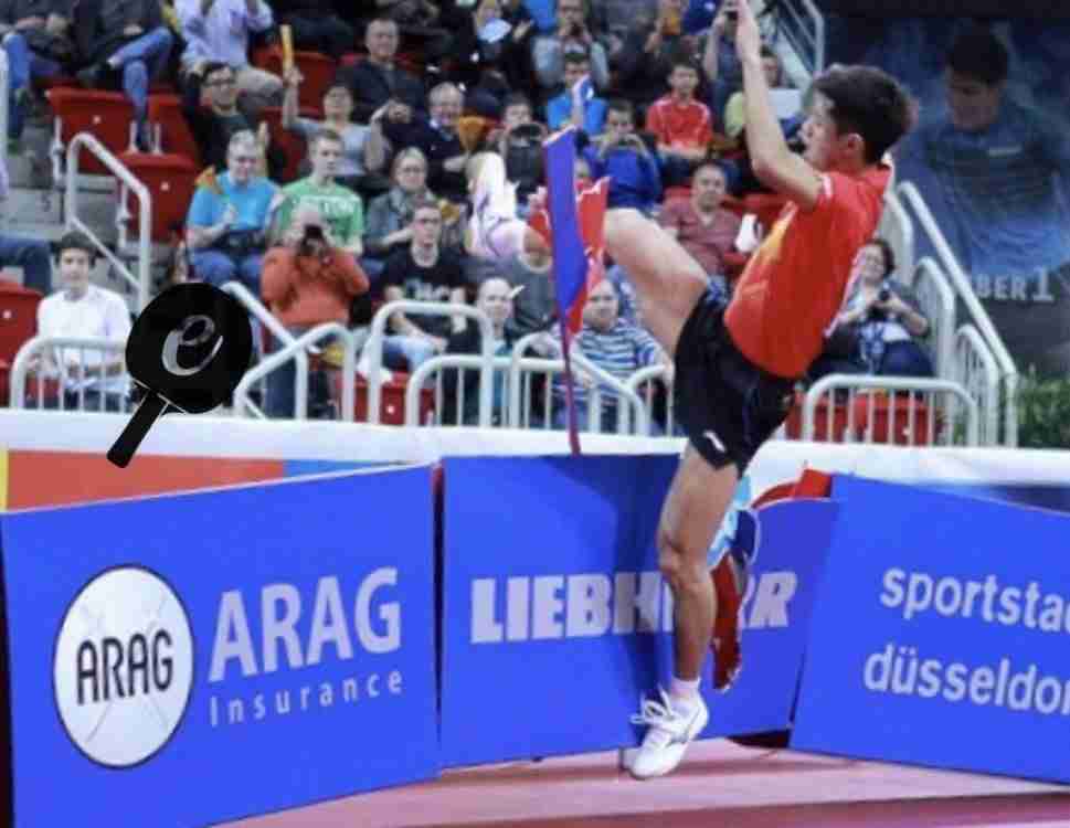 Zhang Jike kicking barriers