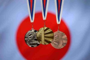 Medal set, gold silver and bronze, japan flag in background